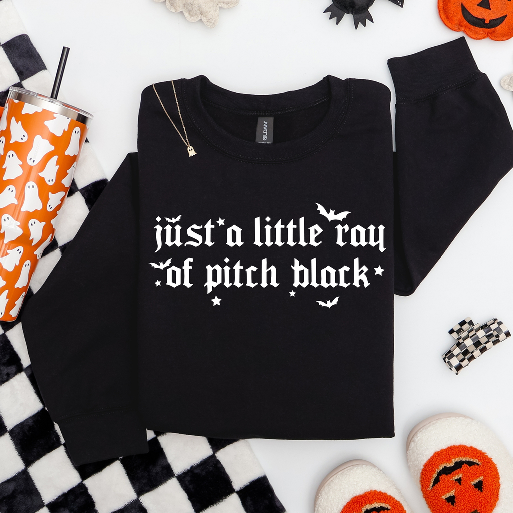 JUST A LITTLE RAY OF PITCH BLACK (SWEATER)